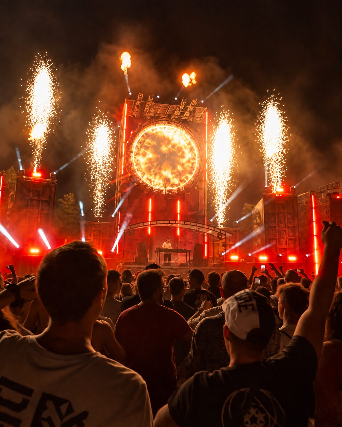 Hummingfields Festival crowd and pyrotechnics at night, Italy
